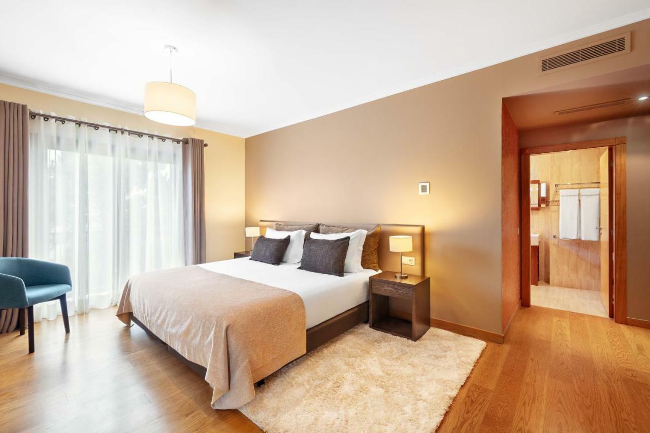 Cascade Wellness Resort Lagos Dış mekan fotoğraf A bedroom in a hotel